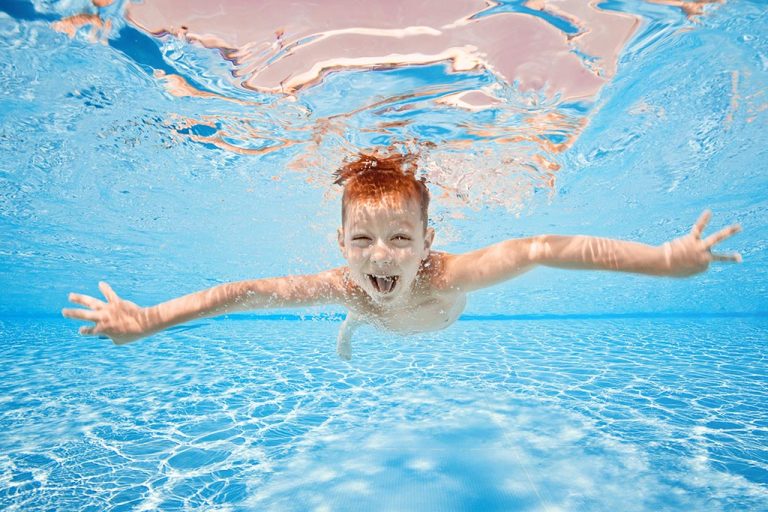 boy swimming in Basingstoke at Apollo Hotel